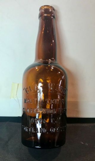 Vintage Clark Woodward Drug Co.  Portland Oregon Amber Embossed Bottle