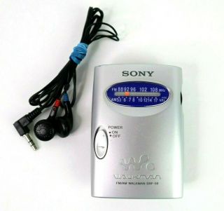 Vintage Sony Walkman Personal Am/fm Stereo Radio W/ Belt Clip Ear Phones Srf - 59
