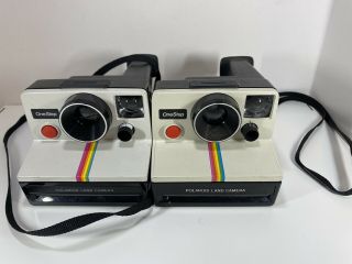 Two Vintage Polaroid Sx 70 One Step Land Cameras With Rainbow Stripe
