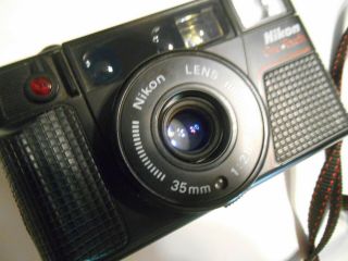 Vintage Nikon Camera One Touch 35mm 1:2.  8 Point And Shoot Film Properly