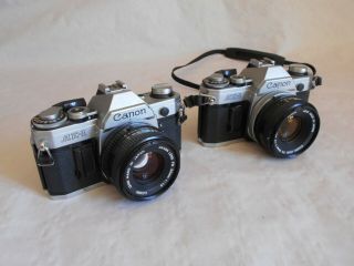 2 X Canon Ae - 1 Slr Cameras With Fd 1:1.  8 Lens To Repair