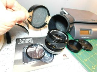 Vtg.  50mm Camera Lens 1:1.  4 S.  S.  C.  For Canon Ae - 1 W/caps,  Filter,  Booklets & Case