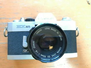 Canon Ex Auto Ql 35mm Slr Film Camera With 50 Mm 1:1.  8 And 125 Mm 1:3.  5