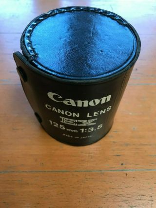 Canon EX Auto QL 35mm SLR Film Camera with 50 mm 1:1.  8 and 125 mm 1:3.  5 3