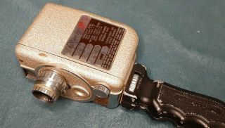 Revere 8 Model B - 63 Movie Camera With Grip And Film - Content Unknown