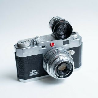 Petri 2.  8 35mm Rangefinder Camera,  F/2.  8 45mm Lens,  And Light Meter