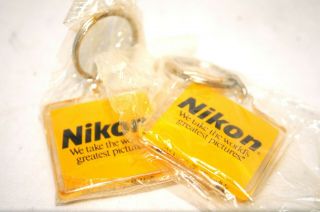 Two Nikon Vintage Keychains Old Stock Nos Key Chains (f - 34)