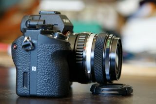 Olympus OM - System G.  ZUIKO Auto - W 35mm F2.  8 Lens - With Sony E Adapter 2