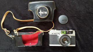Petri 7 35mm Rangefinder Film Camera W/ 45mm F2.  8 Lens,  Leather Case