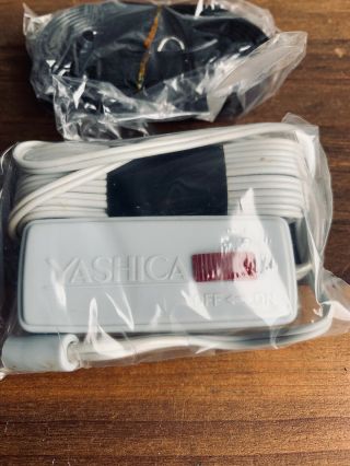 Yashica 800 Electro Camera 8mm Accessories Remote Controller & Strap