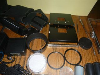 Vtg Box of Camera equipment Flash,  Filters,  lens,  shutter release cables etc 3