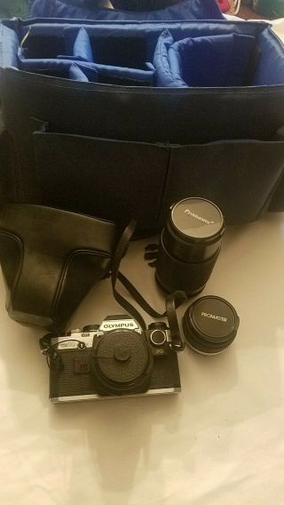 Vintage Olympus Om10 Camera And Two Lenses And Case.