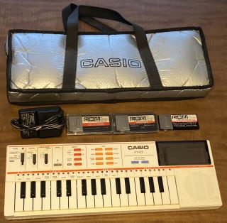 Casio Pt 82 Keyboard Vintage Synthesizer,  Bag With World Songs Disney