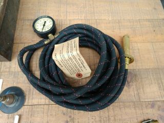 Vintage Schrader air hose and fitting kit.  tire valves.  pressure gauge 3