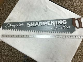 Vintage Saw Sharpening Sign Hand Painted On An Old Handsaw
