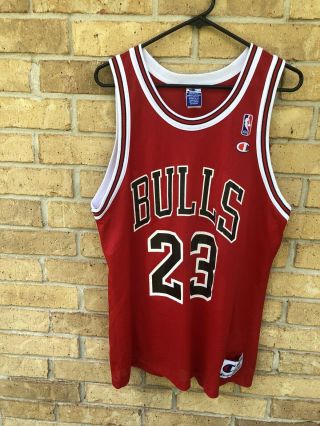 Vintage 90s Michael Jordan Champion Chicago Bulls Red Jersey Size 44
