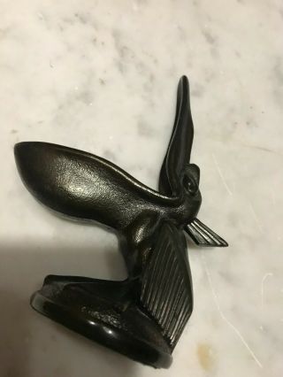 Vintage cast iron Pelican Pipe Holder 