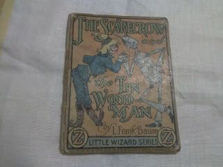 The Scarecrow And The Tin Wood - Man By L.  Frank Baum