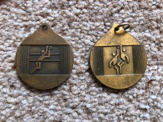 (2) Vintage 1976 Montreal Olympics Volleyball Commemorative Bronze Medal Pendants