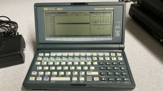 Hp 200lx Palmtop Computer With Power Supply And Serial Cable