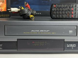 TOSHIBA VCR W - 614R 4 Head Hi - Fi.  W/ remote & movie.  & great 2