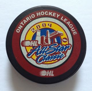 2004 Ohl All - Star Game Puck - Peterborough Petes Host - Corey Perry - Jeff Carter,