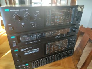 Sansui Stereo - A - 707 Amplifier,  T - 707 Tuner,  D - 77r Tape Deck,  Se - 77 Equalizer