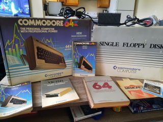 Commodore 64 W/ Floppy Disc Drive ,  All Cables And Manuals