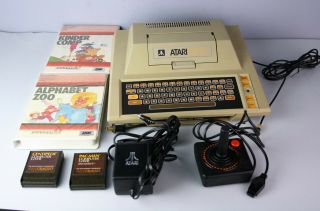 Atari 400 Computer W/ 4 Games,  Power Cord,  & Joystick
