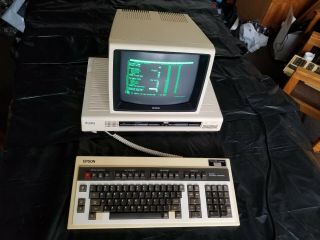 Vintage Epson Qx - 10 Cp/m Computer In Good Operable.  Approx 1983
