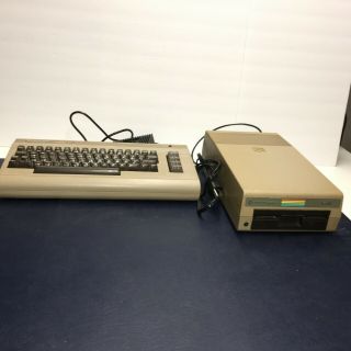Commodore 64 Keyboard And Disc Drive,  And