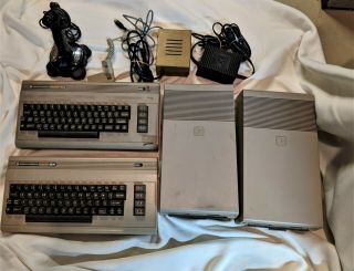 Two Commodore C - 64 Systems With Drives And Power Supplies,