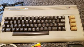 Commodore 64 Computer With Power Supply,  Cables,  and Gorf Game Cartridge 2