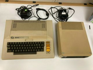 Atari 800 Computer And Atari 810 Disk Drive With Power Supply And Cables