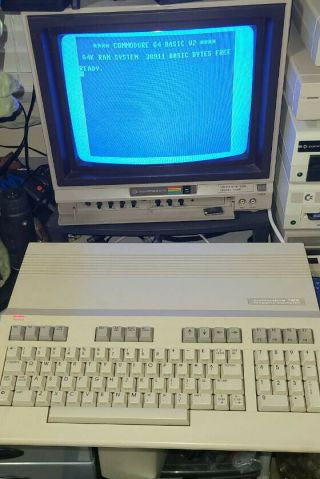 Commodore 128 Computer with Power Supply and Manuals. 2