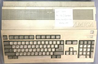 Amiga 500 Computer Commodore V1.  3 WB and,  includes mouse/PS/disks 2