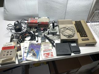 Commodore 64 Bundle; 1541 Disk Drive Floppies Power Supply Cables And More Read