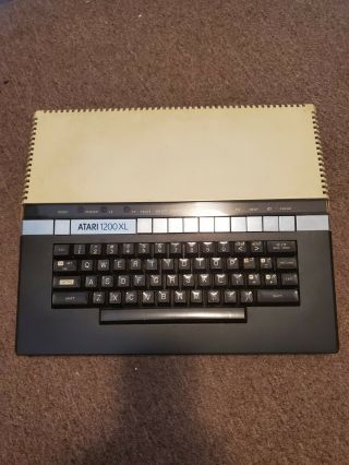 Atari 1200xl Computer With Power Adapter And Owners Guide.