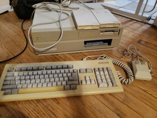 Commodore Amiga 2000 W/ Mouse,  Keyboard,  Books,  Disks,  External Drives