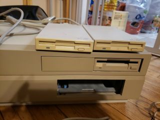 Commodore Amiga 2000 w/ mouse,  keyboard,  books,  disks,  external drives 2