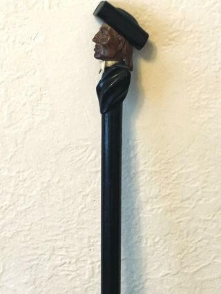 Walking Cane With The Handle Carved In The Shape Of A Preacher Man.  Circa 1900