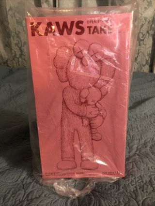 Kaws Take Pink Figure Fast Now In Hand