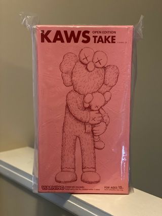 Kaws Take Pink Figure Order In Hand