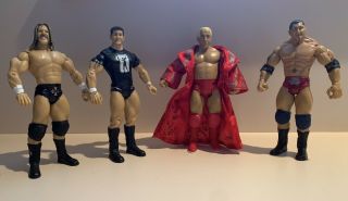 Wwe Evolution Figures: Triple H,  Randy Orton,  Rick Flair,  And Batista