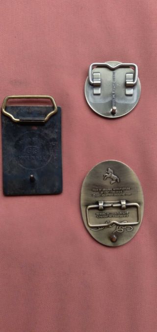 Vintage Official Colt,  Official S&W and a Winchester Belt Buckle.  All Are Brass 2