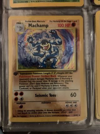 First Edition Shadowless Holographic Machamp 8/102 (near)