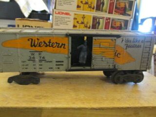 Lionel Postwar 3474 Western Pacific Yellow Feather Operating Box Car