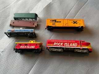 Tyco Rock Island Locomotive And Caboose And Various Box Cars