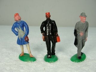 Three Beton Railroad Figures - Man Woman Red Cap