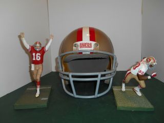 San Francisco 49er ' s Riddell Helmet,  McFarlane Figures - Joe Montana,  Jerry Rice 3